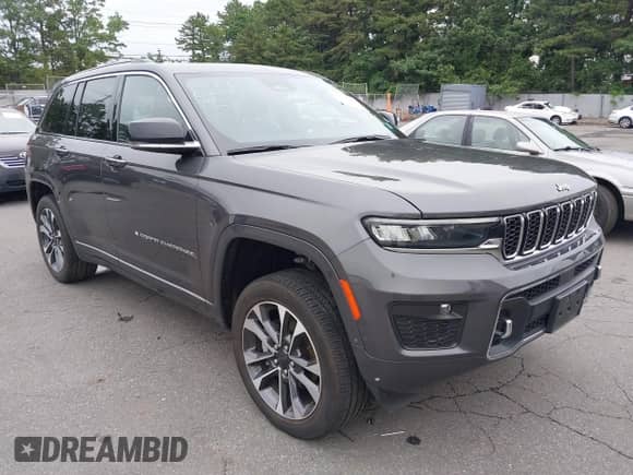 2023 Jeep Grand Cherokee Overland z VIN 1C4RJHDGXP8883305, wystawiony jako IAAI lot #42579196 z przebiegiem 20 189 mil mil oraz . Historia ofert i sprzedaży dostępna na DreamBid. Obrazek 1.