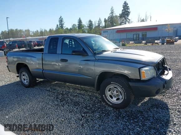 2005 Dodge Dakota ST with VIN 1D7HW22K05S206111, listed as a IAAI auction lot 42338621 with 159,563 mi miles and . Bid and sale history available at DreamBid. Image 14.