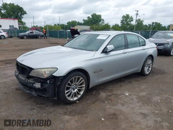 2011 BMW 7 Series 750i xDrive with VIN WBAKC6C57BC395254, listed as a IAAI auction lot 42719449 with 212,096 mi miles and . Bid and sale history available at DreamBid. Image 18.