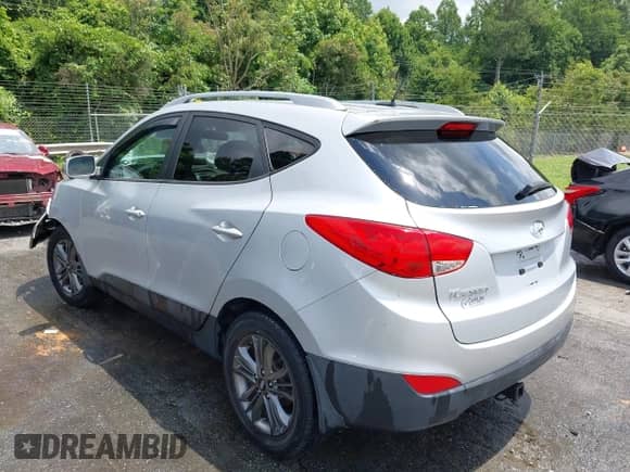 2015 Hyundai Tucson Limited z VIN KM8JU3AG7FU951976, wystawiony jako IAAI lot #42508991 z przebiegiem 128 583 mil mil oraz . Historia ofert i sprzedaży dostępna na DreamBid. Obrazek 3.