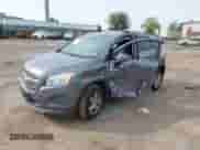 2015 Chevrolet Trax LT with VIN KL7CJRSB3FB118258, listed as a IAAI auction lot 42437439 with 138,557 mi miles and . Bid and sale history available at DreamBid. Image 2.