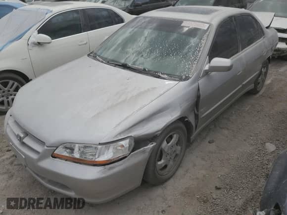 1998 Honda Accord EX with VIN 1HGCG5651WA031089, listed as a Copart auction lot 64525605 with Not provided miles and Non repairable. Bid and sale history available at DreamBid. Image 1.