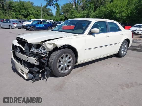 2008 Chrysler 300 Limited with VIN 2C3KA33G48H120184, listed as a IAAI auction lot 42624646 with 196,981 mi miles and . Bid and sale history available at DreamBid. Image 18.
