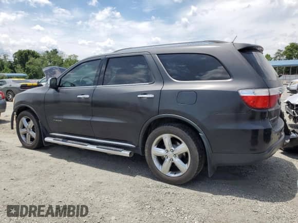 2013 Dodge Durango Citadel with VIN 1C4RDHEG8DC571935, listed as a Copart auction lot 60273705 with 169,219 mi miles and Salvage title. Bid and sale history available at DreamBid. Image 2.
