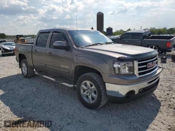 2013 GMC Sierra 1500 SLT с VIN 3GTP2WE79DG125341, выставлен на аукционе Copart как лот 69387625 с пробегом 245 621 миль миль и Списание • Salvage title. История ставок и продаж доступна на DreamBid. Изображение 4.