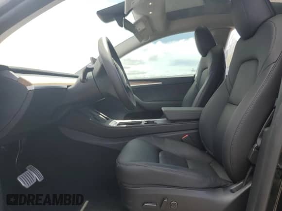 2023 Tesla Model Y Performance z VIN 7SAYGDEF0PF958265, wystawiony jako Copart lot #65881755 z przebiegiem 9 581 mil mil oraz Szkoda całkowita • Salvage title. Historia ofert i sprzedaży dostępna na DreamBid. Obrazek 7.