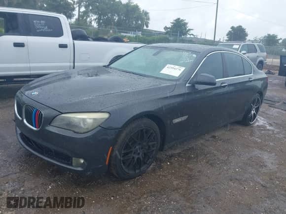 2011 BMW 7 Series 750i xDrive with VIN WBAKC6C54BC394675, listed as a IAAI auction lot 42394276 with 207,246 mi miles and . Bid and sale history available at DreamBid. Image 2.