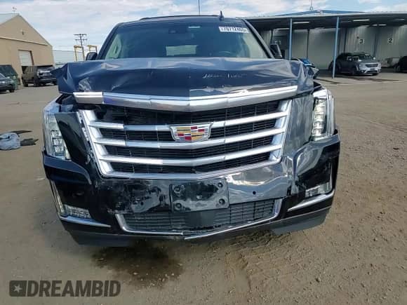 2017 Cadillac Escalade ESV Premium Luxury с VIN 1GYS4JKJ0HR388616, выставлен на аукционе Copart как лот 70712465 с пробегом 124 418 миль миль и Списание • Salvage title. История ставок и продаж доступна на DreamBid. Изображение 14.
