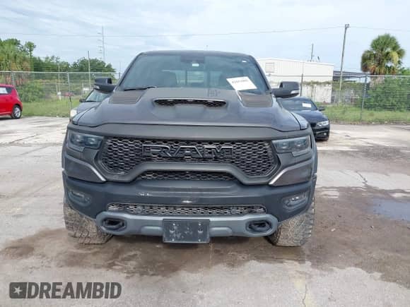 2021 Ram 1500 TRX z VIN 1C6SRFU98MN820577, wystawiony jako IAAI lot #42652005 z przebiegiem 43 429 mil mil oraz . Historia ofert i sprzedaży dostępna na DreamBid. Obrazek 12.