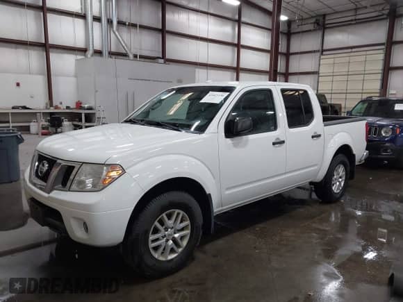 2016 Nissan Frontier SV z VIN 1N6AD0EVXGN765854, wystawiony jako IAAI lot #43465196 z przebiegiem 71 731 mil mil oraz . Historia ofert i sprzedaży dostępna na DreamBid. Obrazek 19.