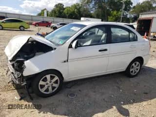 2009 Hyundai Accent Auto GLS with VIN KMHCN46C19U333090, listed as a Copart auction lot 70753635 with 124,508 mi miles and Salvage title. Bid and sale history available at DreamBid. Image 1.
