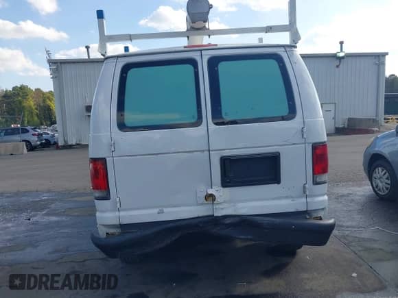 2013 Ford Econoline Cargo Commercial with VIN 1FTNE2EW7DDA67547, listed as a IAAI auction lot 43039595 with 156,606 mi miles and . Bid and sale history available at DreamBid. Image 6.