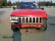 1996 Jeep Grand Cherokee с VIN 1J4EZ58Y5TC142263, выставлен на аукционе Copart как лот 70532894 с пробегом Не указан миль и Списание • Salvage title. История ставок и продаж доступна на DreamBid. Изображение 5.