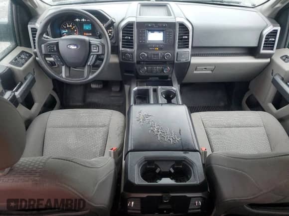 2018 Ford F-150 XLT z VIN 1FTEX1EP9JKD77168, wystawiony jako Copart lot #69857105 z przebiegiem 107 582 mil mil oraz Szkoda całkowita • Salvage title. Historia ofert i sprzedaży dostępna na DreamBid. Obrazek 8.