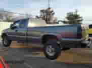 2000 Chevrolet Silverado 2500 LS z VIN 1GCGK29U1YE289916, wystawiony jako Copart lot #43776895 z przebiegiem 195 621 mil mil oraz Szkoda całkowita • Salvage title. Historia ofert i sprzedaży dostępna na DreamBid. Obrazek 2.