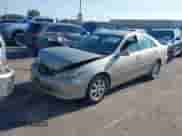 2005 Toyota Camry STD with VIN 4T1BE32KX5U084110, listed as a IAAI auction lot 43162822 with 210,556 mi miles and . Bid and sale history available at DreamBid. Image 16.