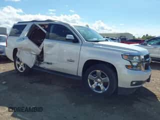 2017 Chevrolet Tahoe LT with VIN 1GNSCBKC1HR253068, listed as a IAAI auction lot 43275624 with 139,930 mi miles and . Bid and sale history available at DreamBid. Image 1.