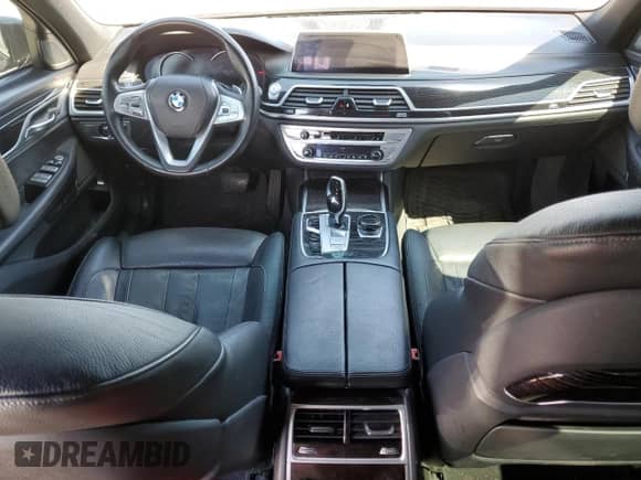 2017 BMW 7 Series 740e xDrive with VIN WBA7J2C33HG497980, listed as a Copart auction lot 50244384 with 115,728 mi miles and . Bid and sale history available at DreamBid. Image 8.