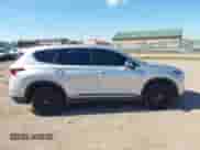 2019 Hyundai Santa Fe SE z VIN 5NMS2CAD0KH001481, wystawiony jako IAAI lot #43080403 z przebiegiem 82 196 mil mil oraz . Historia ofert i sprzedaży dostępna na DreamBid. Obrazek 13.