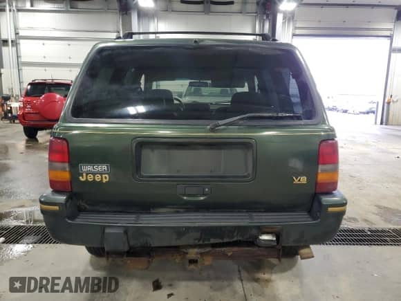 1995 Jeep Grand Cherokee Limited with VIN 1J4GZ78Y1SC516161, listed as a Copart auction lot 81288164 with 271,626 mi miles and Salvage title. Bid and sale history available at DreamBid. Image 6.