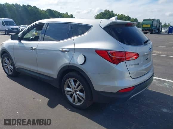 2013 Hyundai Santa Fe Sport with VIN 5XYZW3LA6DG001939, listed as a IAAI auction lot 43048039 with 180,925 mi miles and . Bid and sale history available at DreamBid. Image 3.