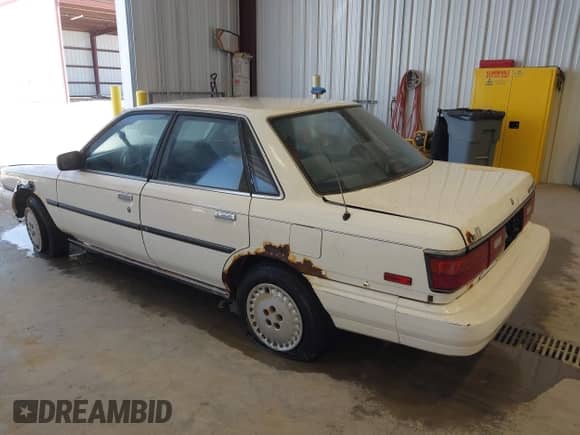 1987 Toyota Camry LE z VIN JT2SV22E7H3174276, wystawiony jako IAAI lot #42609453 z przebiegiem 280 117 mil mil oraz . Historia ofert i sprzedaży dostępna na DreamBid. Obrazek 3.