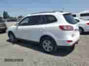 2010 Hyundai Santa Fe Limited with VIN 5NMSKDAG1AH358201, listed as a Copart auction lot 64977195 with 112,583 mi miles and Salvage title. Bid and sale history available at DreamBid. Image 2.