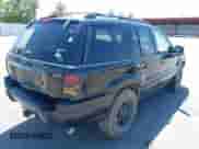 2002 Jeep Grand Cherokee Sport with VIN 1J4GW38S52C236109, listed as a IAAI auction lot 42317056 with 193,949 mi miles and . Bid and sale history available at DreamBid. Image 4.