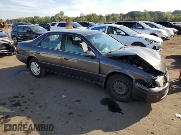 2000 Toyota Camry LE with VIN JT2BG22K8Y0516352, listed as a Copart auction lot 80176155 with Not provided miles and Salvage title. Bid and sale history available at DreamBid. Image 4.