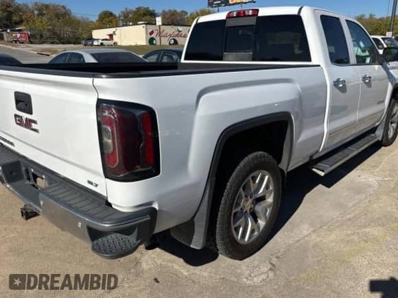 2017 GMC Sierra 1500 SLT z VIN 1GTV2NEJ1HZ175363, wystawiony jako Copart lot #83465374 z przebiegiem 168 048 mil mil oraz Czysty tytuł • Clean title. Historia ofert i sprzedaży dostępna na DreamBid. Obrazek 4.