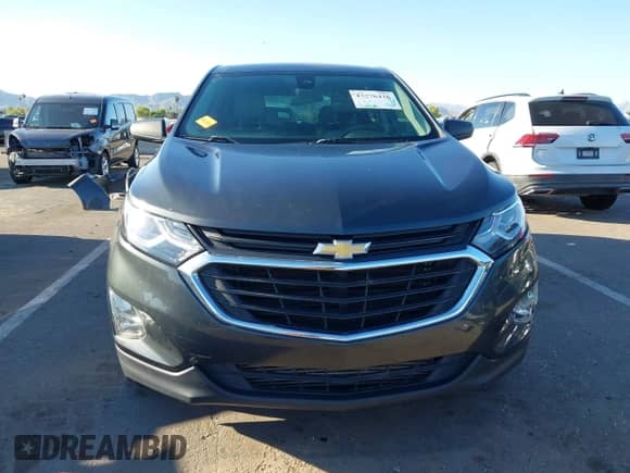 2021 Chevrolet Equinox LS z VIN 2GNAXHEV1M6136760, wystawiony jako IAAI lot #43276426 z przebiegiem 74 766 mil mil oraz . Historia ofert i sprzedaży dostępna na DreamBid. Obrazek 13.