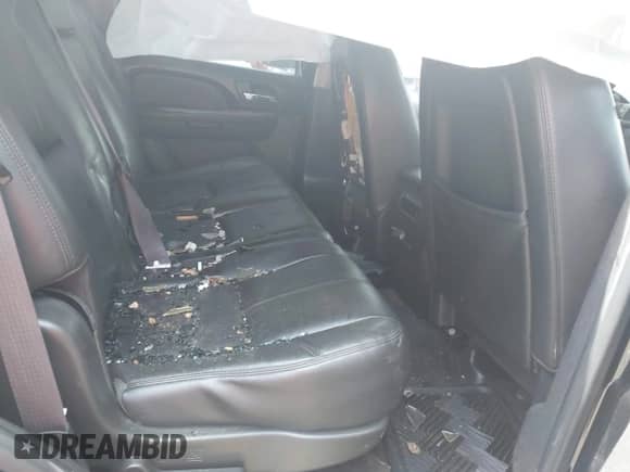 2013 Chevrolet Tahoe LT with VIN 1GNSCBE09DR366696, listed as a IAAI auction lot 42201250 with 199,105 mi miles and . Bid and sale history available at DreamBid. Image 8.