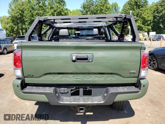 2022 Toyota Tacoma SR z VIN 3TMCZ5AN8NM488001, wystawiony jako Copart lot #70700575 z przebiegiem 32 582 mil mil oraz Szkoda całkowita • Salvage title. Historia ofert i sprzedaży dostępna na DreamBid. Obrazek 6.