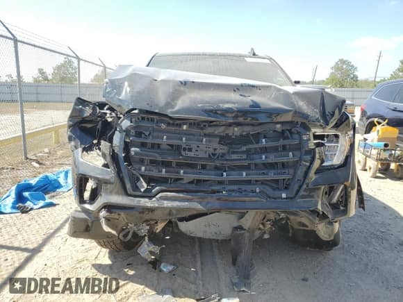 2019 GMC Sierra 1500 Elevation with VIN 1GTR8CEDXKZ423048, listed as a Copart auction lot 76867424 with 84,882 mi miles and Salvage title. Bid and sale history available at DreamBid. Image 5.