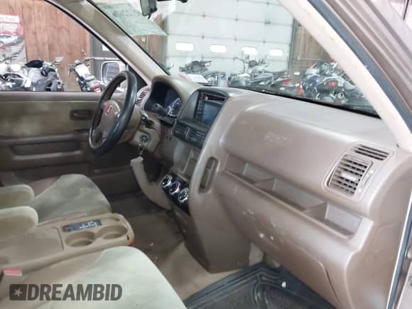 2002 Honda CR-V EX with VIN JHLRD78862C056432, listed as a IAAI auction lot 42722676 with 210,422 mi miles and . Bid and sale history available at DreamBid. Image 5.