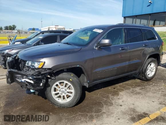 2020 Jeep Grand Cherokee Altitude with VIN 1C4RJFAG1LC293798, listed as a Copart auction lot 65387115 with 53,189 mi miles and Salvage title. Bid and sale history available at DreamBid. Image 1.