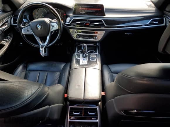 2019 BMW 7 Series 740i z VIN WBA7E2C54KB217252, wystawiony jako Copart lot #69630145 z przebiegiem 96 529 mil mil oraz Nie do naprawy • Non repairable. Historia ofert i sprzedaży dostępna na DreamBid. Obrazek 8.