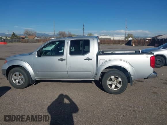 2011 Nissan Frontier Pro-4X z VIN 1N6AD0EV3BC434991, wystawiony jako IAAI lot #42086934 z przebiegiem 189 908 mil mil oraz . Historia ofert i sprzedaży dostępna na DreamBid. Obrazek 14.