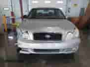 2003 Hyundai Sonata with VIN KMHWF25S03A787704, listed as a IAAI auction lot 41299327 with 208,289 mi miles and . Bid and sale history available at DreamBid. Image 12.