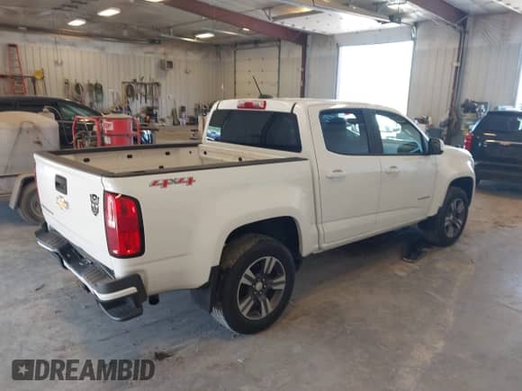2017 Chevrolet Colorado 4WD WT with VIN 1GCGTBEN7H1214060, listed as a IAAI auction lot 42557141 with 107,538 mi miles and . Bid and sale history available at DreamBid. Image 4.