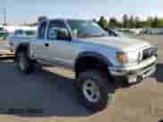2002 Toyota Tacoma z VIN 5TEWN72NX2Z070220, wystawiony jako Copart lot #81276465 z przebiegiem 143 793 mil mil oraz Szkoda całkowita • Salvage title. Historia ofert i sprzedaży dostępna na DreamBid. Obrazek 4.