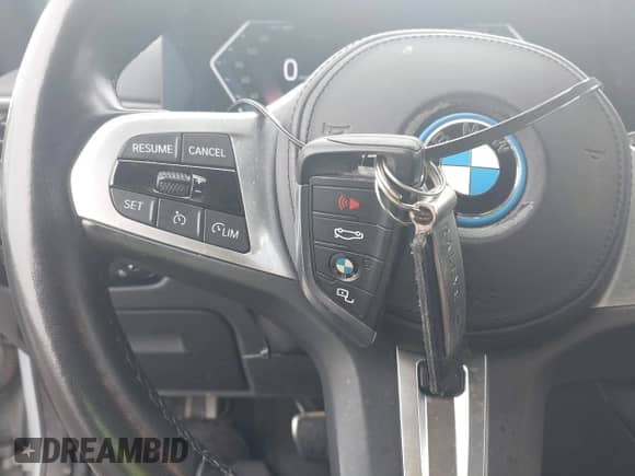2022 BMW i4 eDrive40 with VIN WBY73AW00NFN14842, listed as a IAAI auction lot 42313404 with 23,556 mi miles and . Bid and sale history available at DreamBid. Image 11.