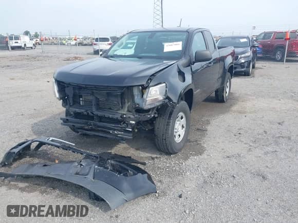2020 Chevrolet Colorado 2WD Work Truck with VIN 1GCHSBEA6L1233776, listed as a IAAI auction lot 42087066 with 71,976 mi miles and . Bid and sale history available at DreamBid. Image 2.