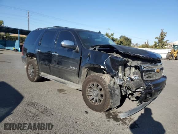 2014 Chevrolet Tahoe LS с VIN 1GNSCAE05ER248852, выставлен на аукционе Copart как лот 80135404 с пробегом 132 523 миль миль и Списание • Salvage title. История ставок и продаж доступна на DreamBid. Изображение 4.