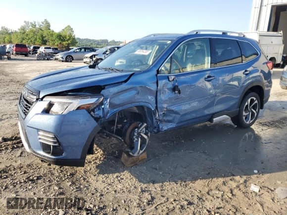 2022 Subaru Forester Touring z VIN JF2SKARC1NH486222, wystawiony jako Copart lot #65854385 z przebiegiem 9 589 mil mil oraz Szkoda całkowita • Salvage title. Historia ofert i sprzedaży dostępna na DreamBid. Obrazek 1.