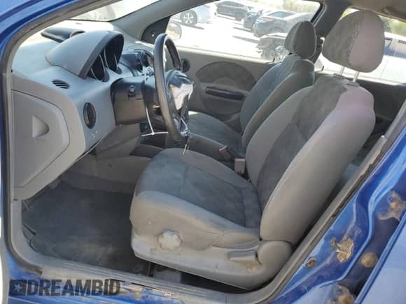 2005 Chevrolet Aveo LS z VIN KL1TD626X5B496871, wystawiony jako Copart lot #75909374 z przebiegiem 147 662 mil mil oraz Szkoda całkowita • Salvage title. Historia ofert i sprzedaży dostępna na DreamBid. Obrazek 7.