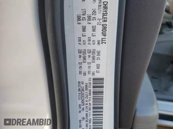 2012 Dodge Durango Crew z VIN 1C4RDJDG3CC242079, wystawiony jako Copart lot #81916925 z przebiegiem 154 935 mil mil oraz Szkoda całkowita • Salvage title. Historia ofert i sprzedaży dostępna na DreamBid. Obrazek 13.