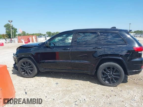 2017 Jeep Grand Cherokee Altitude with VIN 1C4RJFAG7HC792340, listed as a IAAI auction lot 42945088 with 143,122 mi miles and . Bid and sale history available at DreamBid. Image 14.