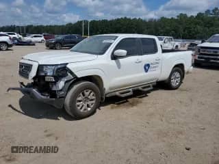 2023 Nissan Frontier SV with VIN 1N6ED1FK1PN659143, listed as a Copart auction lot 60690044 with 13,706 mi miles and Salvage title. Bid and sale history available at DreamBid. Image 1.