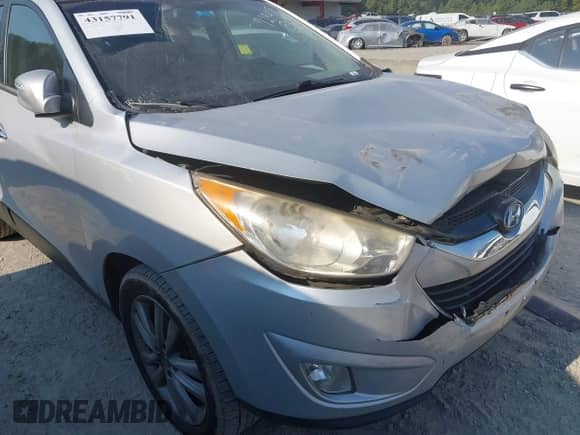 2013 Hyundai Tucson GLS with VIN KM8JUCAC4DU729468, listed as a IAAI auction lot 43157791 with 155,911 mi miles and . Bid and sale history available at DreamBid. Image 6.